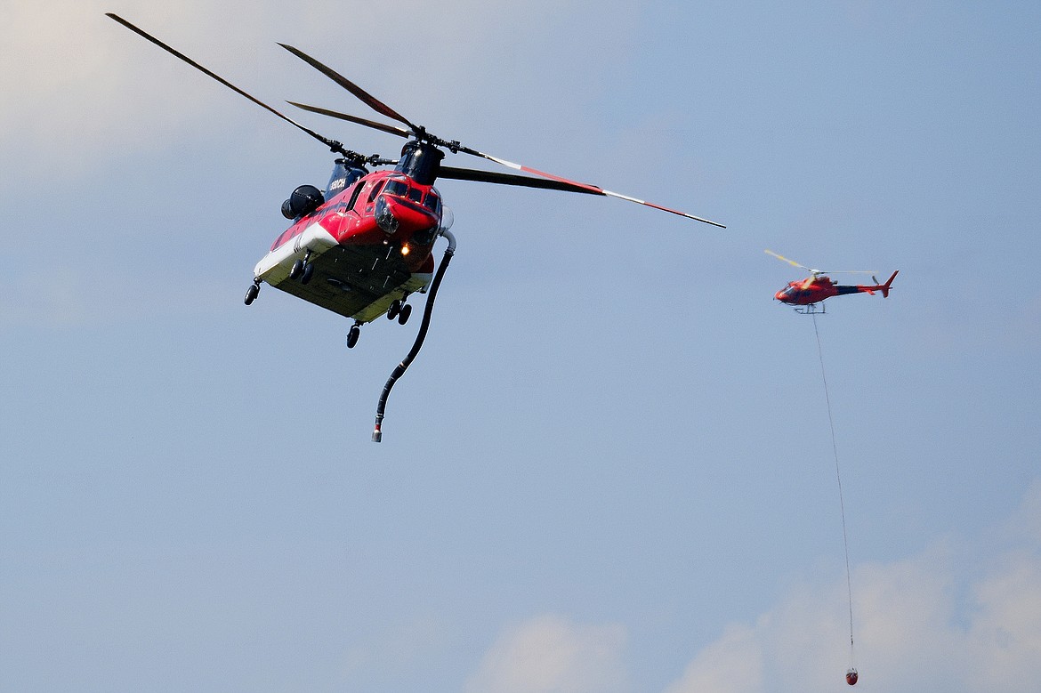 Helicopters fight a wildfire that cropped up on Saturday, July 29, on the north end of Whitefish Lake. (Joseph Raudabaugh photo)