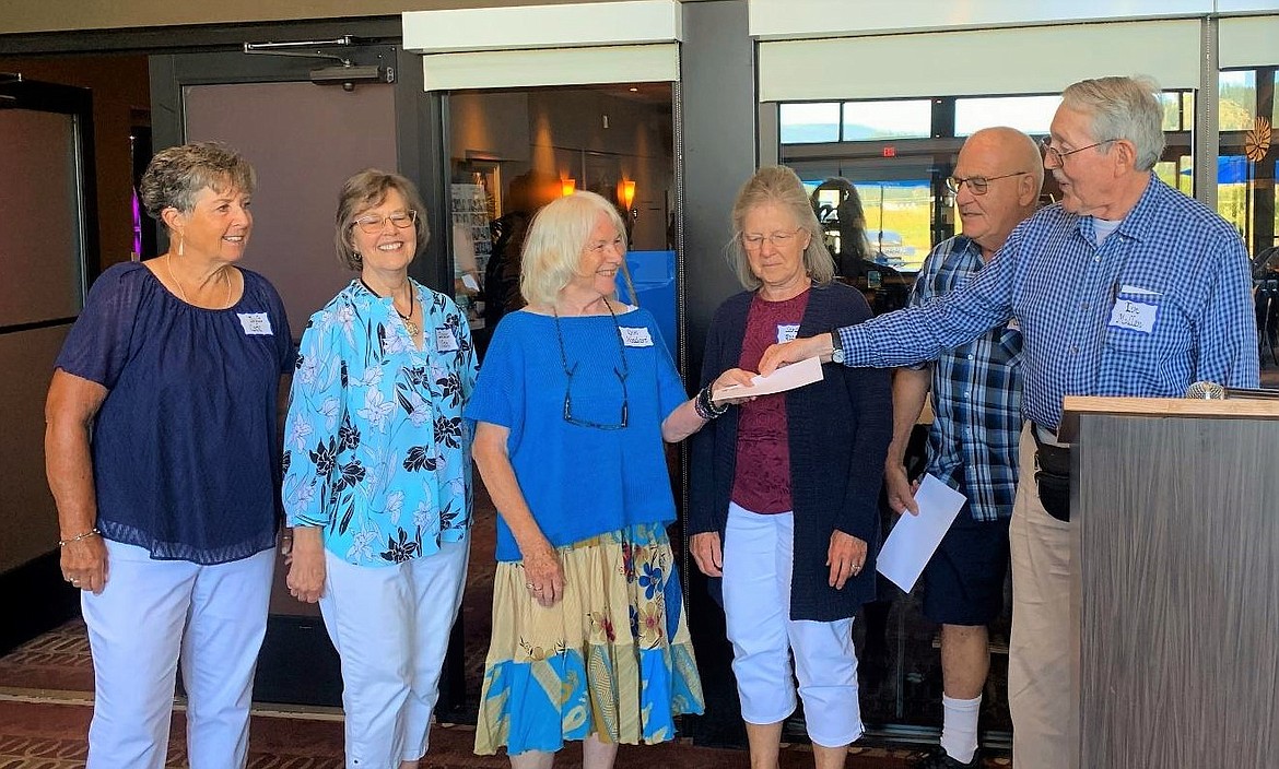 Tim Mullen, presented the class’s traditional donation to the Boundary County Museum to Gini Woodward, Museum Trustee along with other Reunion Committee members present.  (left) Twyla (Dirks) Cope, Darlene (Haagenson) Nason, Gini Woodward, Sandi (Trainer) Reaser, Art Cossairt and Tim Mullen.