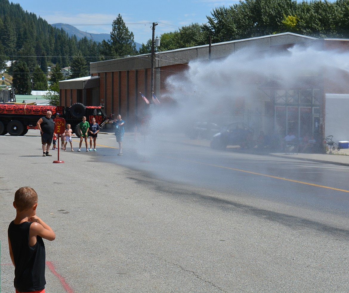 A target is hit during the Make-n-Break as part of Mullan Fireman's Fun Festival Saturday. The two-day celebration hosts competitions for adults and kids as part of a fundraiser for the Mullan Volunteer Fire Department.