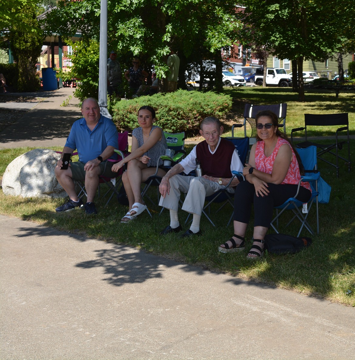 Spectators line up during the parade Saturday at Mullan Fireman's Fun Festival. The two-day celebration hosts competitions for adults and kids as part of a fundraiser for the Mullan Volunteer Fire Department.