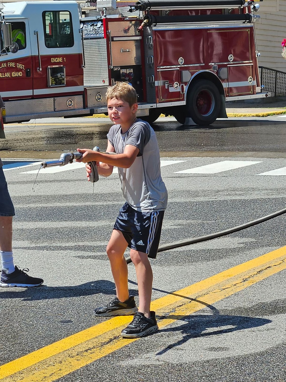 Kids compete in the Mullan Fireman's Fun Festival Sunday. The two-day celebration hosts competitions for adults and kids as part of a fundraiser for the Mullan Volunteer Fire Department.