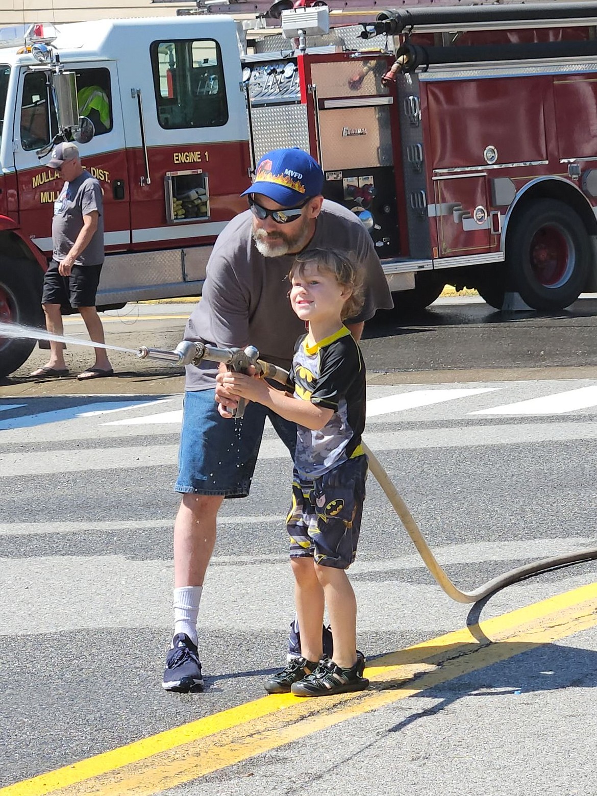 Kids compete in the Mullan Fireman's Fun Festival Sunday. The two-day celebration hosts competitions for adults and kids as part of a fundraiser for the Mullan Volunteer Fire Department.