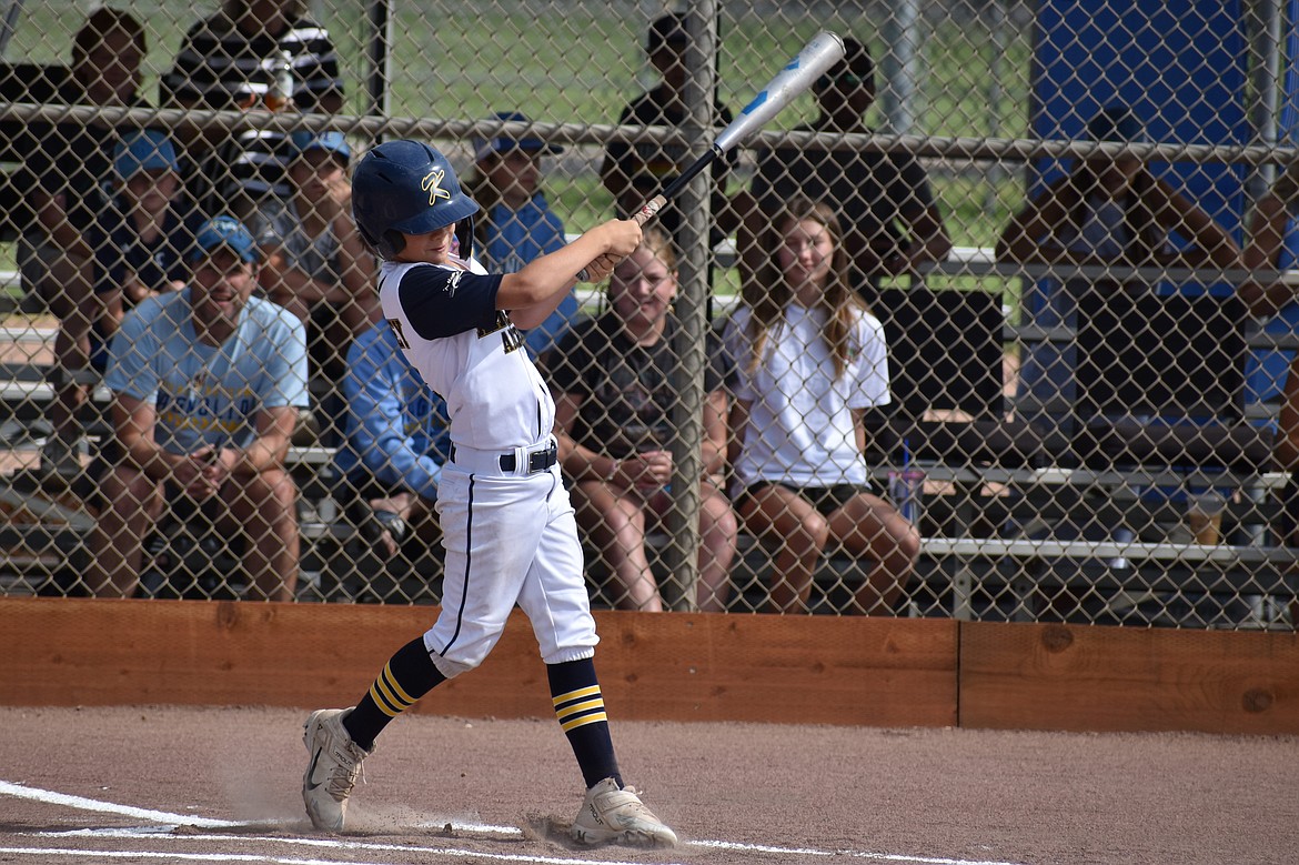 A Kirkland American player swings at a pitch against Magnolia in the championship game of the Washington Little League 8/9/10U State Tournament on Saturday.