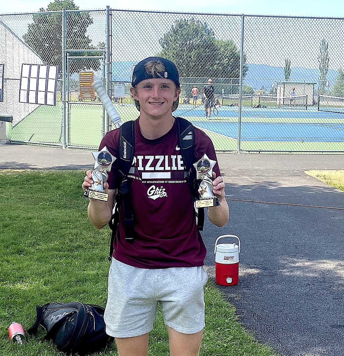 Libby's Ryan Beagle shows off the trophies he won at the Western Montana Open Junior Tournament in Missoula July 23. (Courtesy photo)