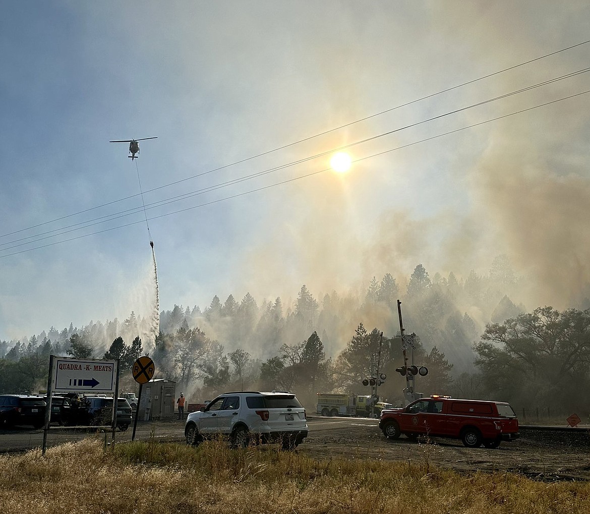 The West Hallett fire spread to 200 acres Monday afternoon and has prompted evacuation notices around the southwestern corner of Spokane.