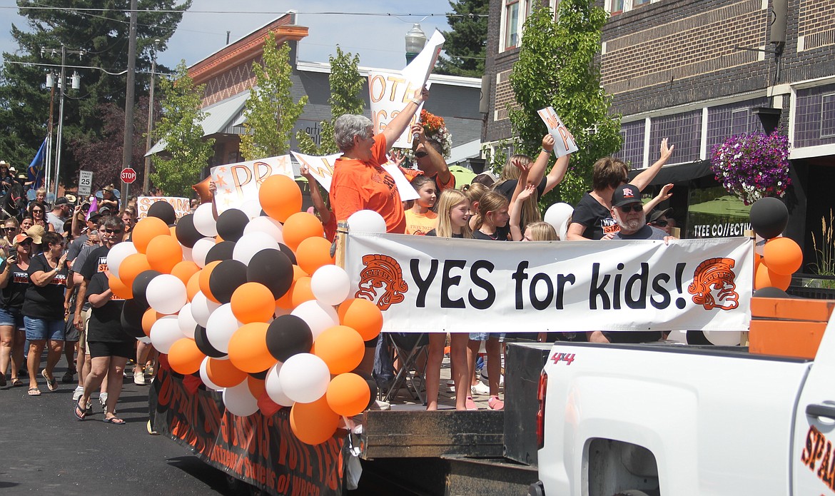 A float followed by a large crowd of supporters in favor of the West Bonner County School District recall made their way down High Street near the end of the parade.