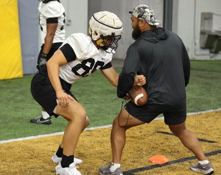 2022 Priest River graduate Matyus McLain participates in a drill designed to teach players how to force a fumble during a University of Idaho summer camp practice at the Kibbie Dome. The former all-state, all-league defensive lineman will wear #89 this season, the same number he wore during his time at Priest River.