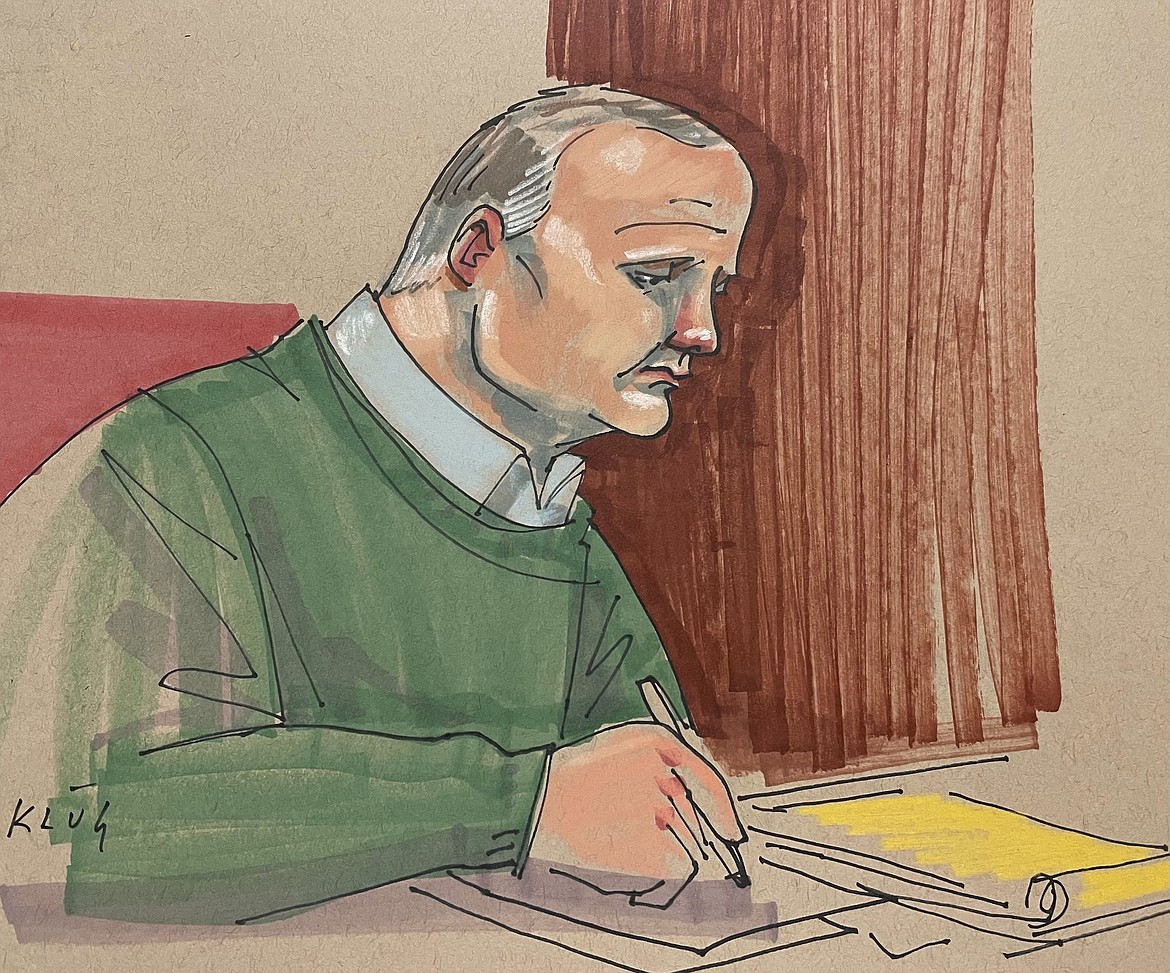 Defendant Robert Bowers takes notes during a sentencing hearing that will determine if he gets a life sentence or the death penalty, in Pittsburgh federal court on Monday, July 31, 2023. Jurors are expected to begin deliberations early Tuesday in the 2018 attack that killed 11 worshippers. (Dave Klug via AP)