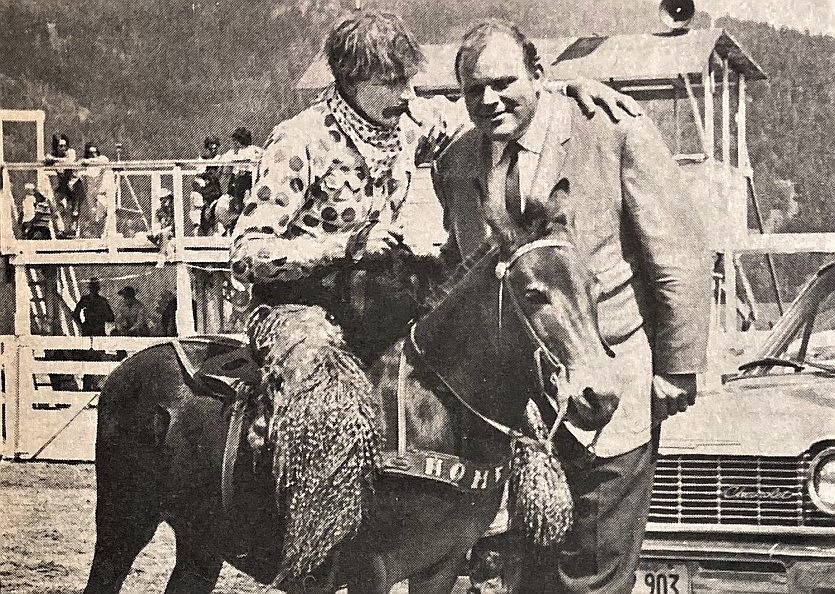 Actor Dan Blocker with rodeo clown Karl Doering at the Kootenai County Fairgrounds.