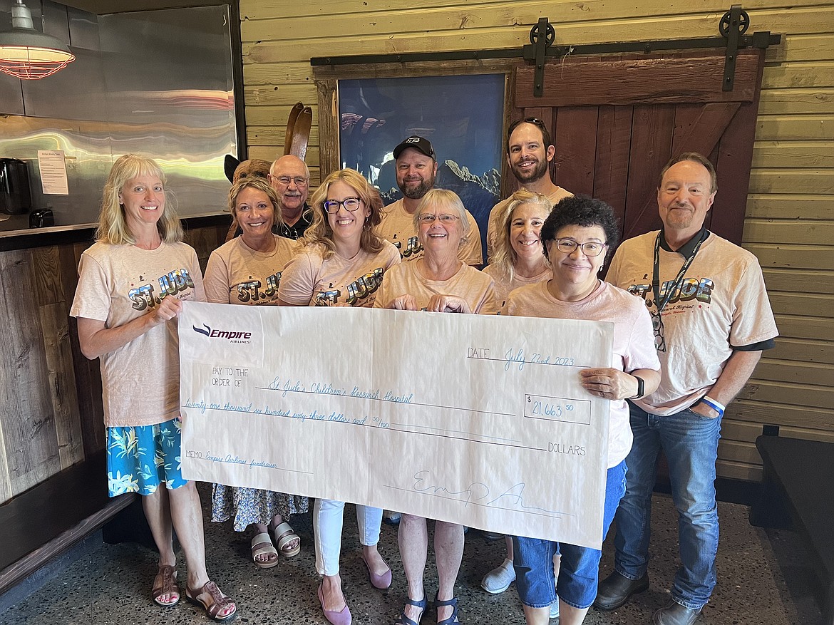 Empire Airlines Fundraising Committee (from left): Martha Goss, Tiffany Stott, Tim Komberec, Marie-Eve Lohman, Matt Micklon, Sharon Simpson, Doug McCan, Stacie Wagner, Cathy Schafer and Scott Marikis.