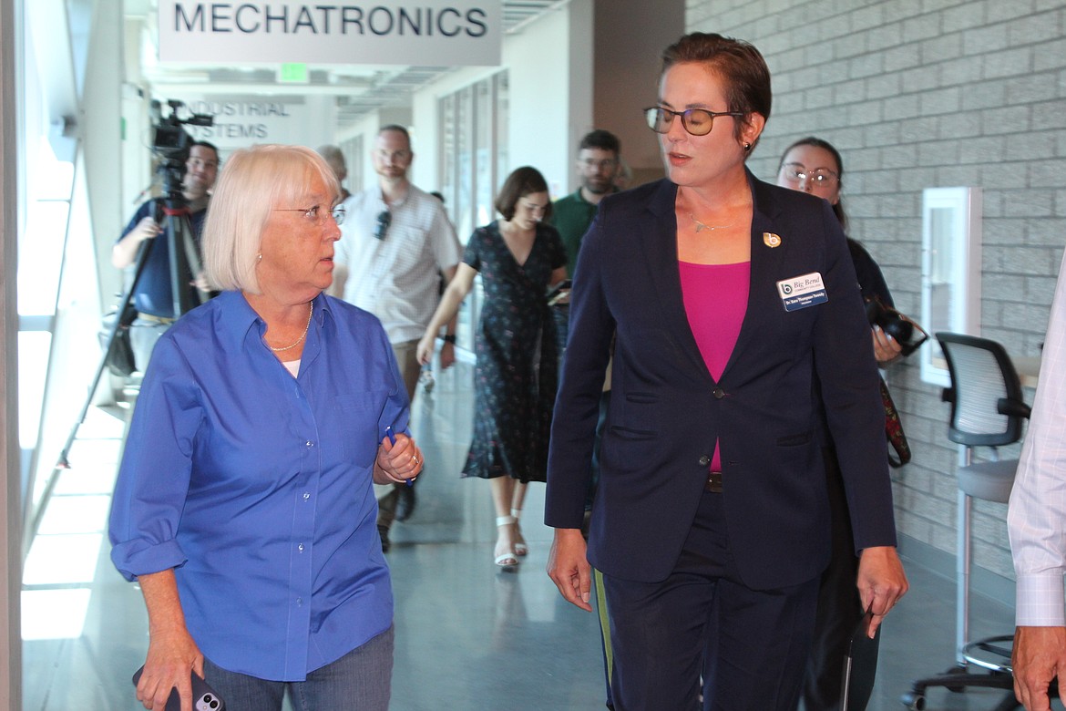 Senator Patty Murray, left, talks with Big Bend Community College President Sara Thompson Tweedy, right.