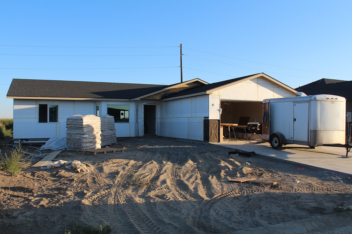 A house nears completion in a development in Quincy. The Quincy market is subject to circumstances that make it different from the rest of the county, according to local real estate agents.