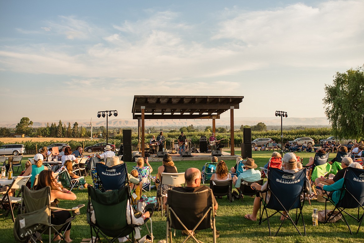 Concertgoers enjoy live music at Yakima Valley’s VanArnam Vineyard’s 2022 summer concert series. Vineyards and wine country events are among the biggest tourist attractions in eastern Washington, and Yakima Valley in particular.