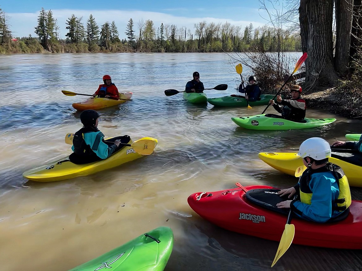 A Montana Kayak Academy instructor leads a whitewater kayaking lesson. (Photo Courtesy of Montana Kayak Academy)
