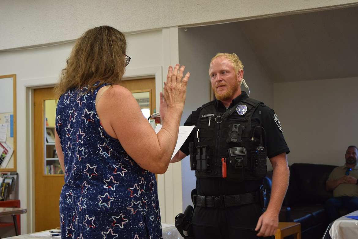 Mayor Michelle Agliano swears in new Soap Lake Police Officer Jacob Leenhouts during Wednesday’s regular city council meeting.