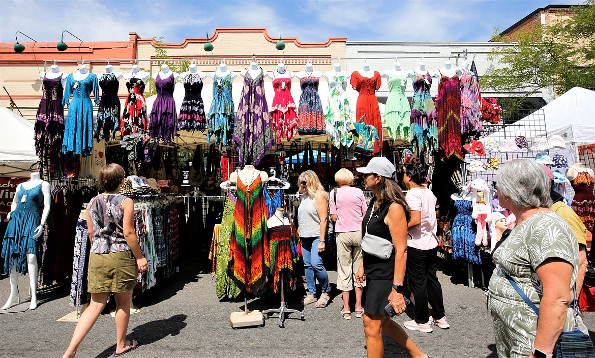People check out dresses for sale at the Street Fair.