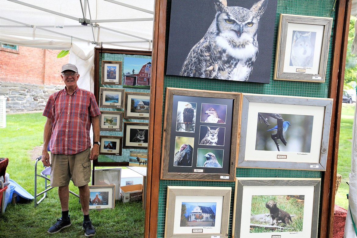 Mike Brodwater of Northern Exposure Photography stands by his work during Taste of Coeur d'Alene.