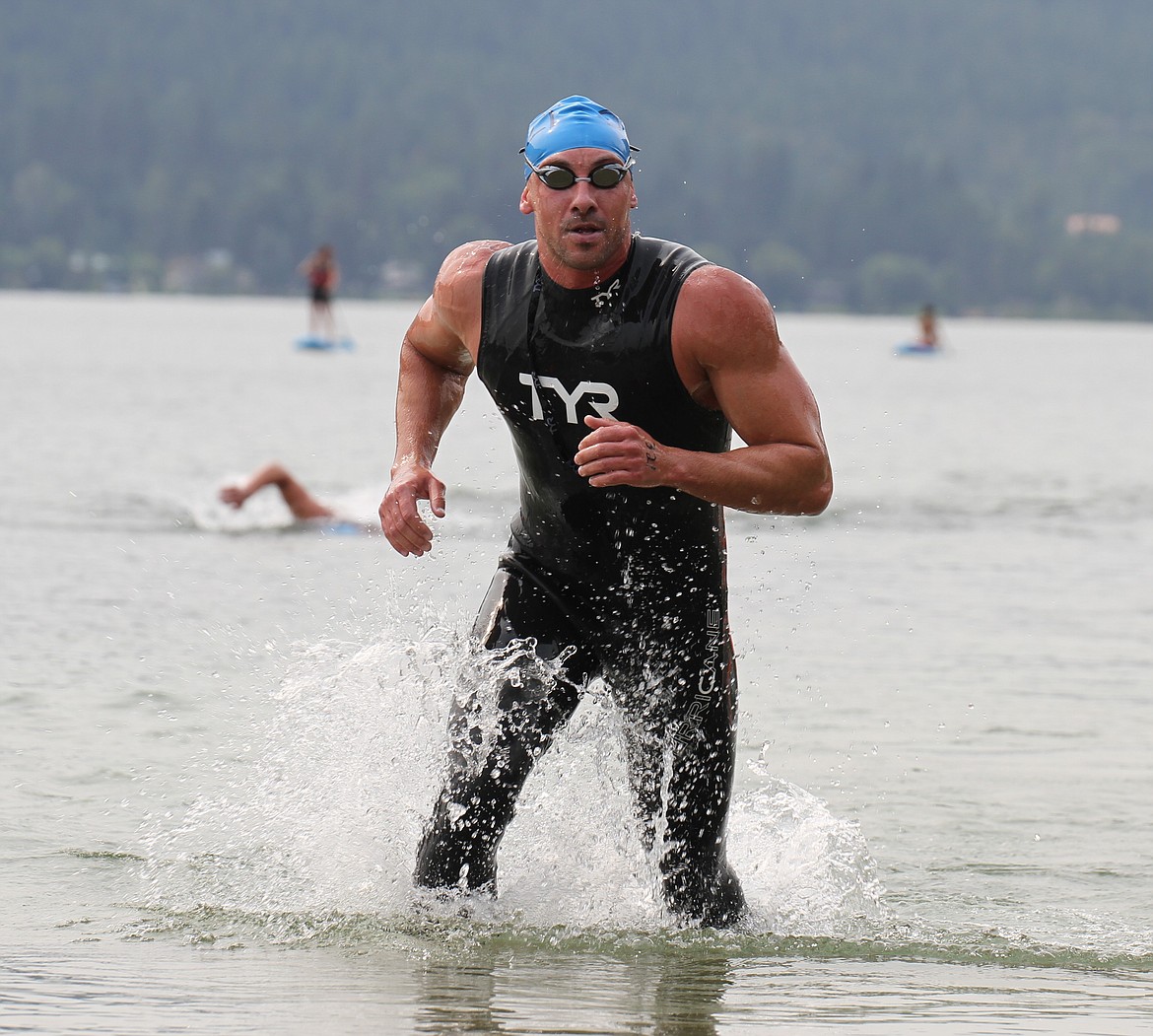 Third place finisher Adam Arzner makes his way to the finish line on Saturday.