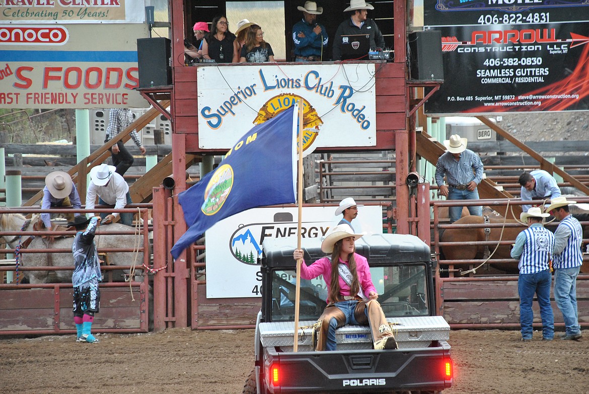 Rodeo royalty Lanie Crabb entered the Superior Fairgrounds Arena on the back of her father's side-by-side this year rather than horseback while she recovers from knee surgery.(Mineral Independent/Amy Quinlivan)