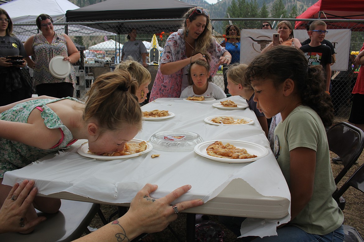 Digging into the pie-eating contest at the Mineral County Fair. (Monte Turner/Mineral Independent)