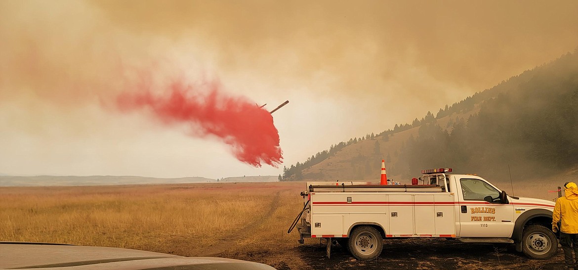 Fire retardant is dropped onto the Niarada Fire west of Elmo on Friday, Aug. 4, 2023. (InciWeb photo)