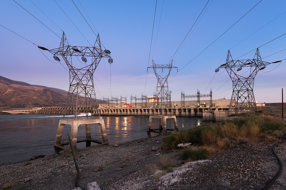 A project to reinforce an embankment at Priest Rapids Dam, pictured, will be finished this month, ahead of schedule.