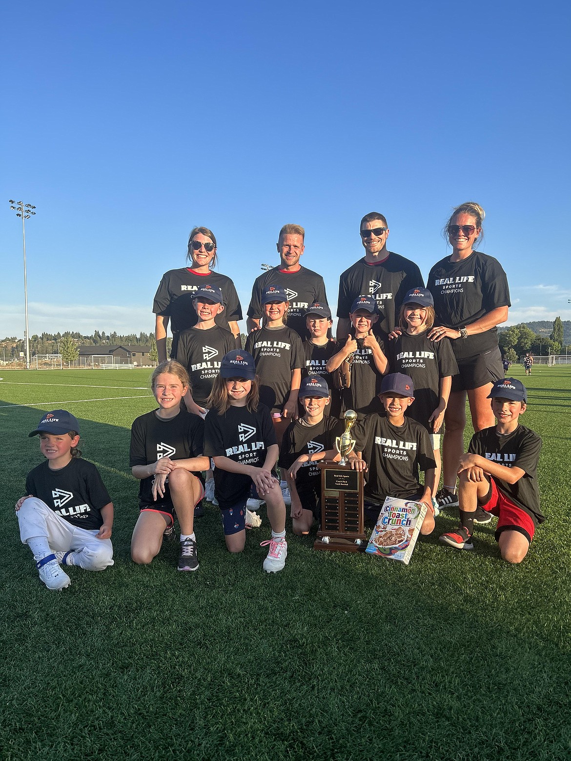 Courtesy photo
Team Gray Wolves won the championship in Real Life's coach-pitch first/second grade baseball league. In the front row from left are Jameson Fore, Brooklyn Helmuth, Margaret Pelphrey, Mason Gallagher, Beau Cleave and Easton Moody; second row from left, Karter Berg, Harper Fore, Simon Rogers, Graham Brown, Remington Swartzendruber; and back row from left, coaches Jordan Helmuth, Gabe Cleave, Taylor Fore and Jenna Fore.