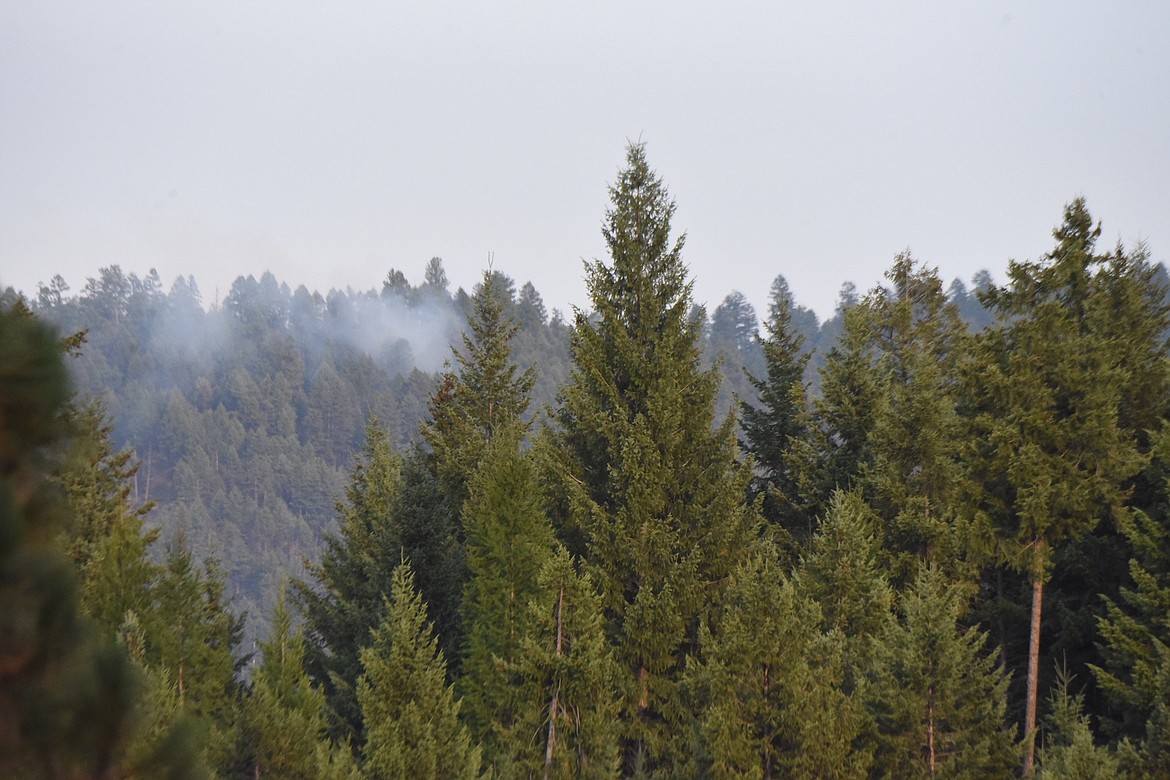 Smoke from one of a few fires on Swede Mountain on Monday evening, Aug. 7. (Scott Shindledecker/The Western News)