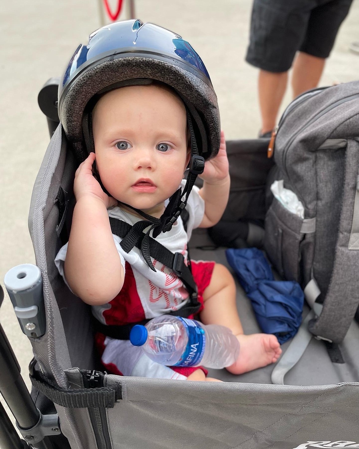 A baby receives a helmet at a Brain Injury Alliance Montana helmet giveaway in 2022. (photo provided)