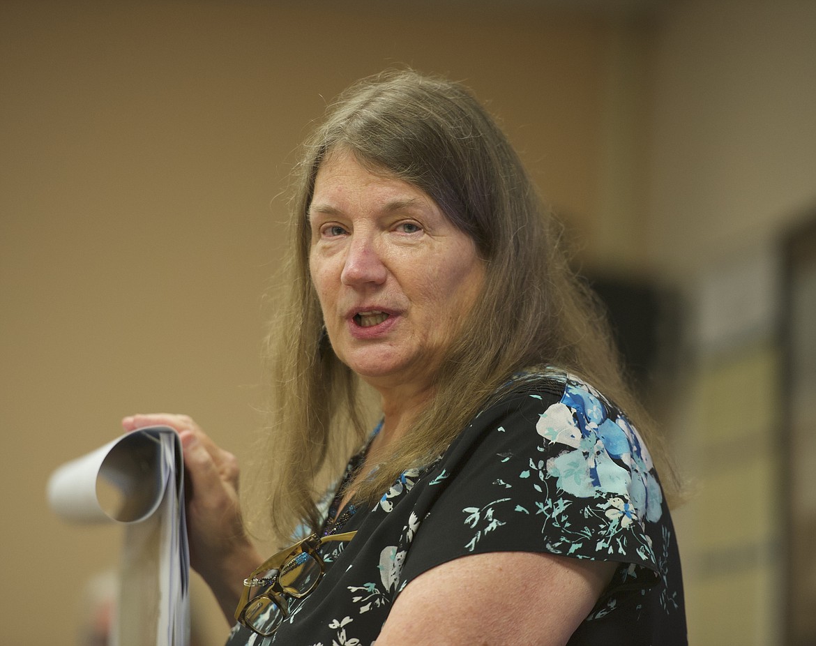 Janet Camel speaks to a full house about a future annexation over Polson Bridge in Polson City Hall. (Max Dupras/Leader)