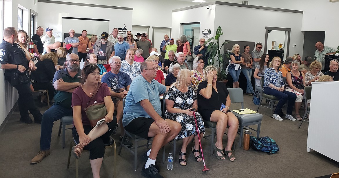 A crowd of Spirit Lake residents attends a City Council meeting to see their new police chief sworn in Tuesday.