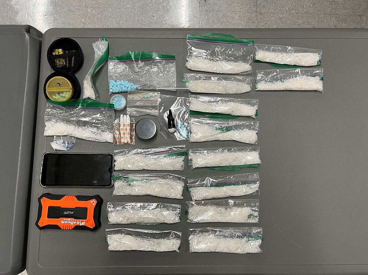 Photo courtesy Kootenai County Sheriff's Office
Evidence seized by KCSO deputies in a traffic stop Wednesday morning on Interstate 90 at milepost 29 included about 200 fentanyl pills, one pound of methamphetamine packaged in one ounce bags, suboxone and multiple pieces of drug paraphernalia.