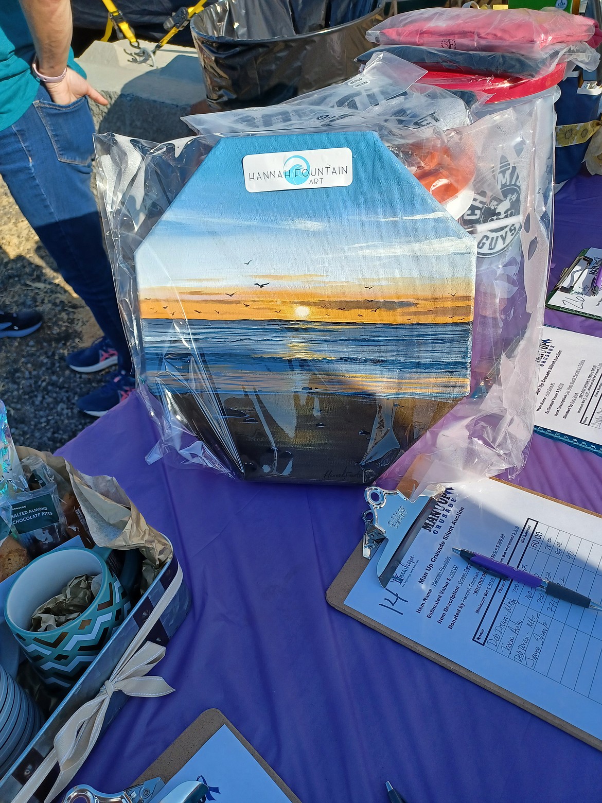 Donated items like those shown here helped raise for New Hope's programs to support victims of domestic violence. Organizers believe about $2,500 was raised through the silent auction which was held at this week's Moses Lake Chamber of Commerce Business After Hours event.