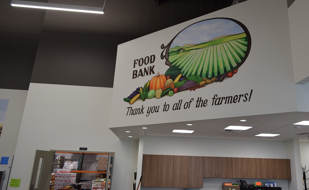 A mural inside the Community Services of Moses Lake office, painted by a local artist, thanking farmers for donating to the food bank.