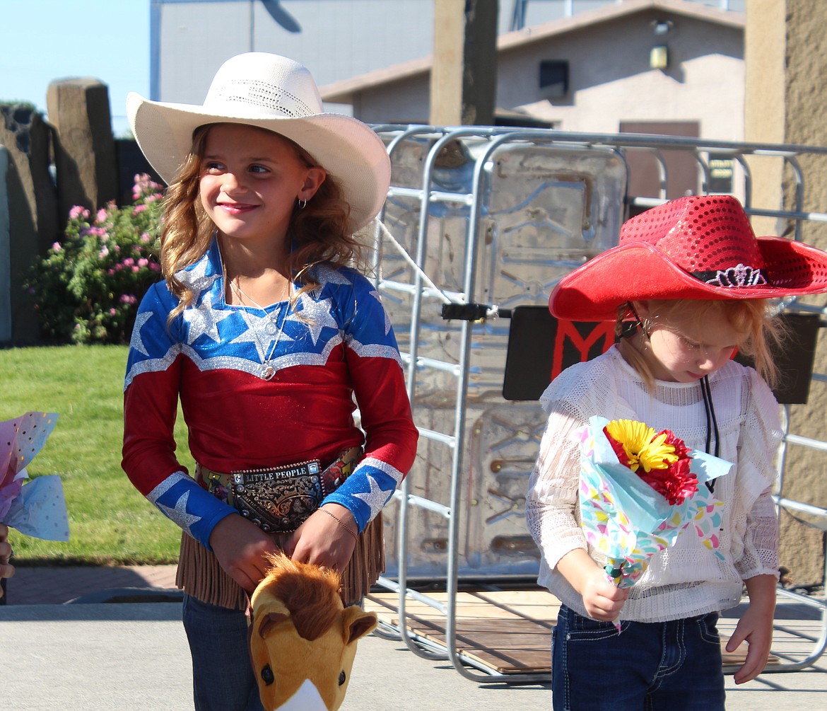 Lila Stacy beams as she realizes she’s queen of the rodeo at the annual Cowboy Breakfast Friday.