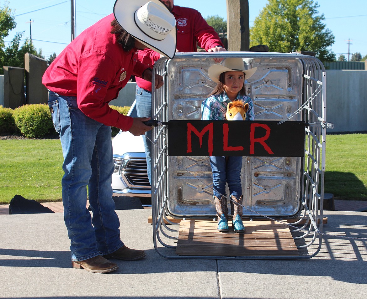 A contestant waits for the chute door to open during the bucking bronc contest at the Pee Wee Rodeo.