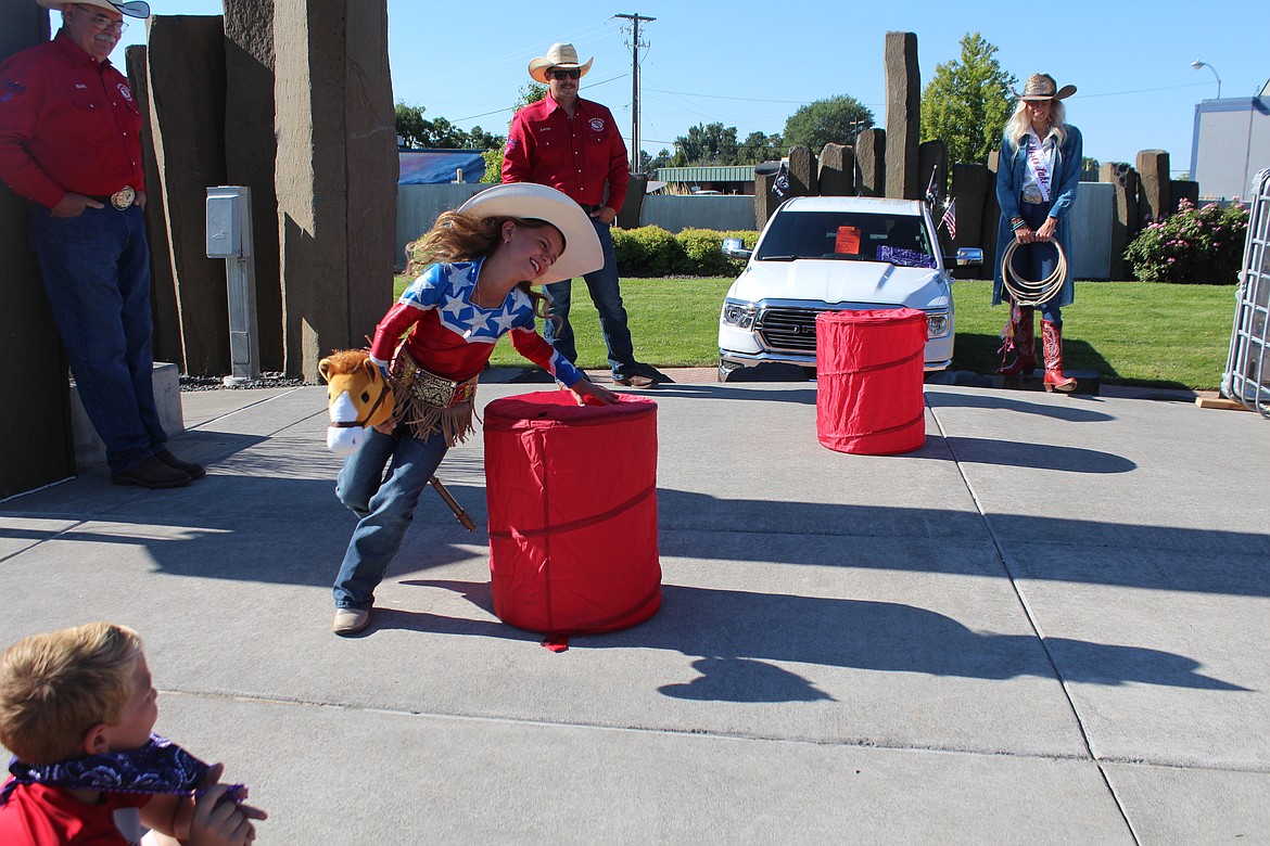 Running the barrels is a traditional rodeo event, and it was featured in the Pee Wee Rodeo Friday at the Cowboy Breakfast.