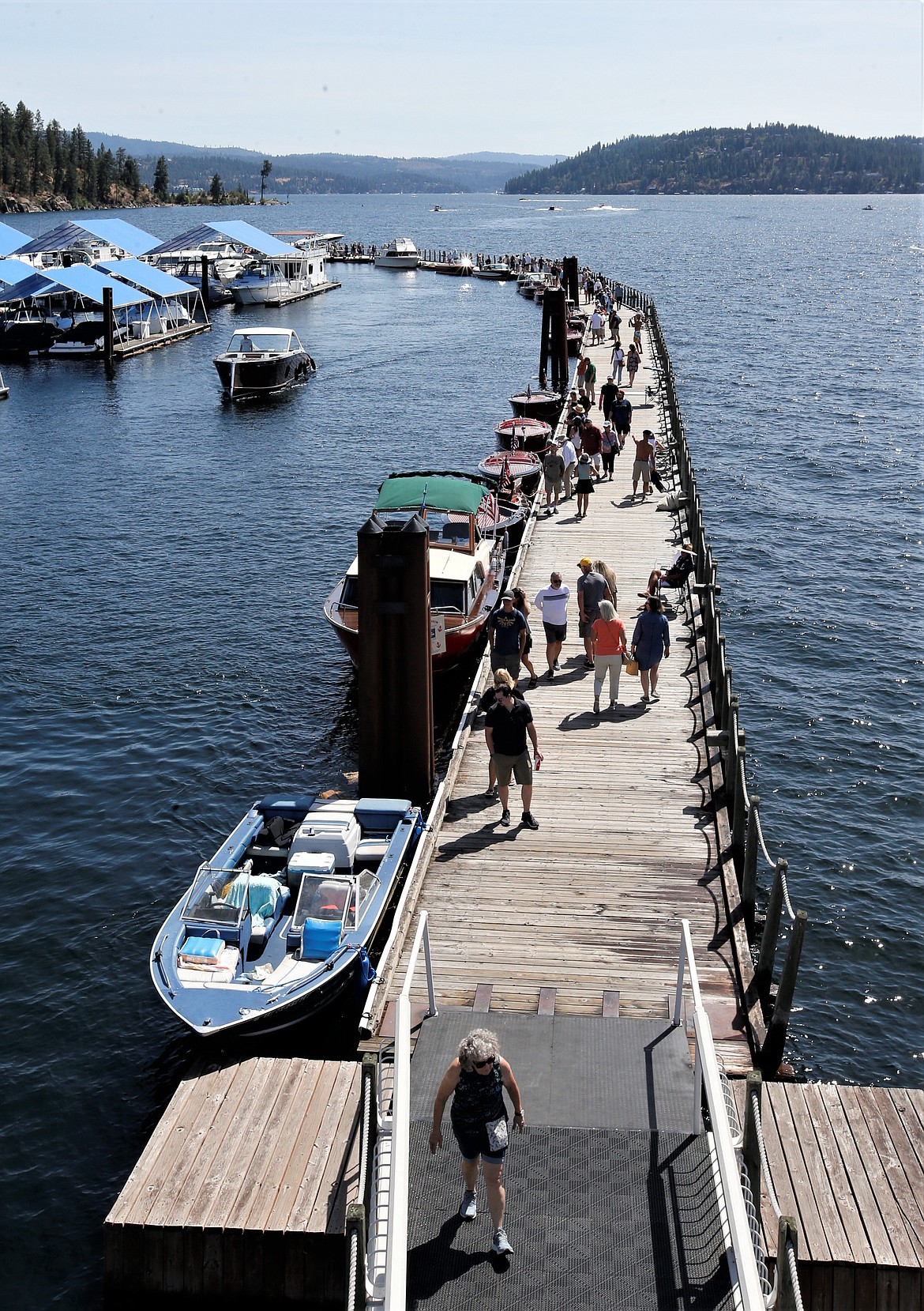 The Boardwalk is busy during the Coeur d'Alene Antique and Classic Boat Festival on Saturday.