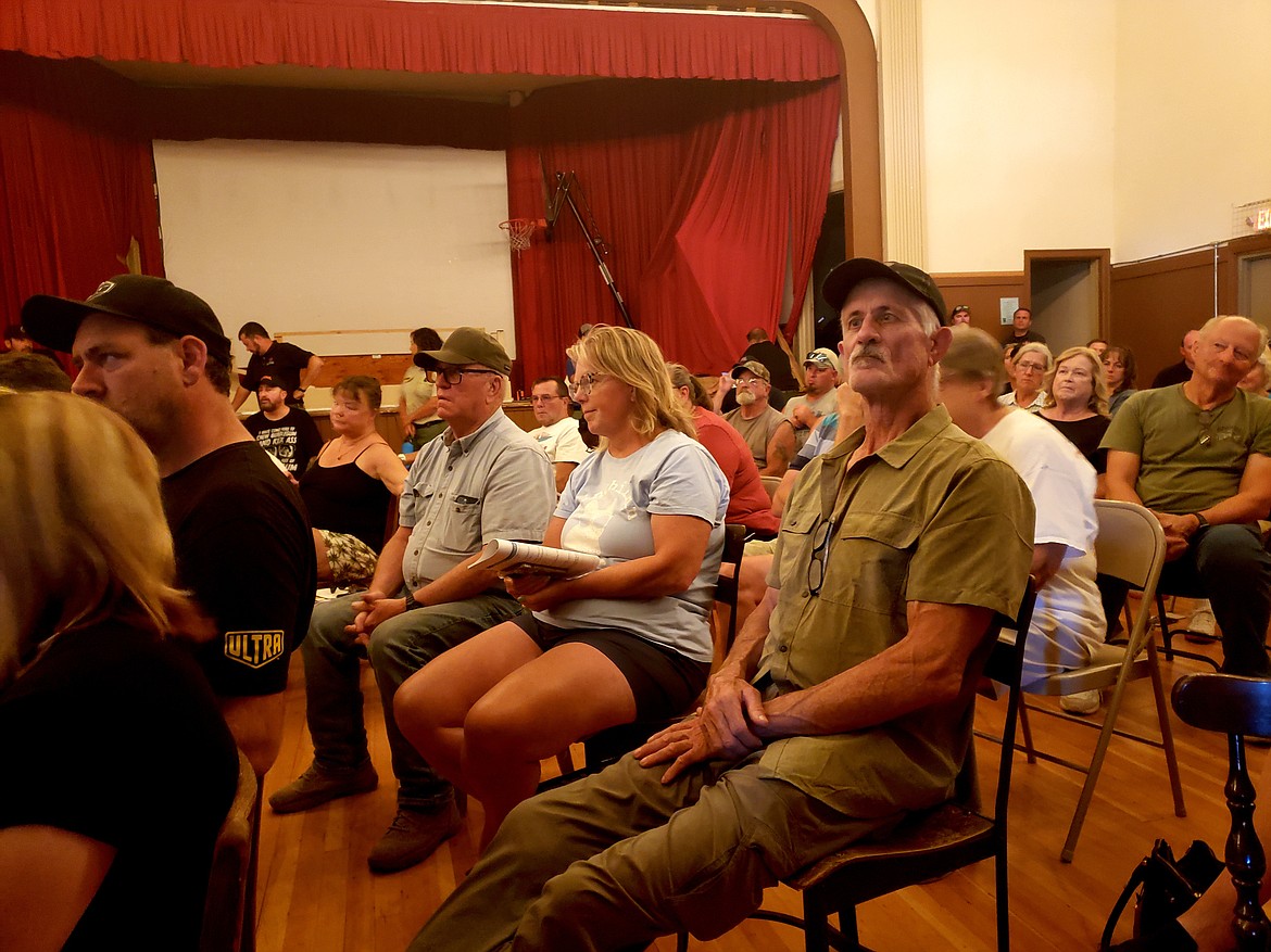 Hundreds of concerned Athol residents attend a community meeting to understand what the Ridge Creek Fire is doing and how emergency teams are responding.