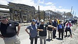Tourists are urged to avoid Maui as hotels prepare to take in evacuees and first responders