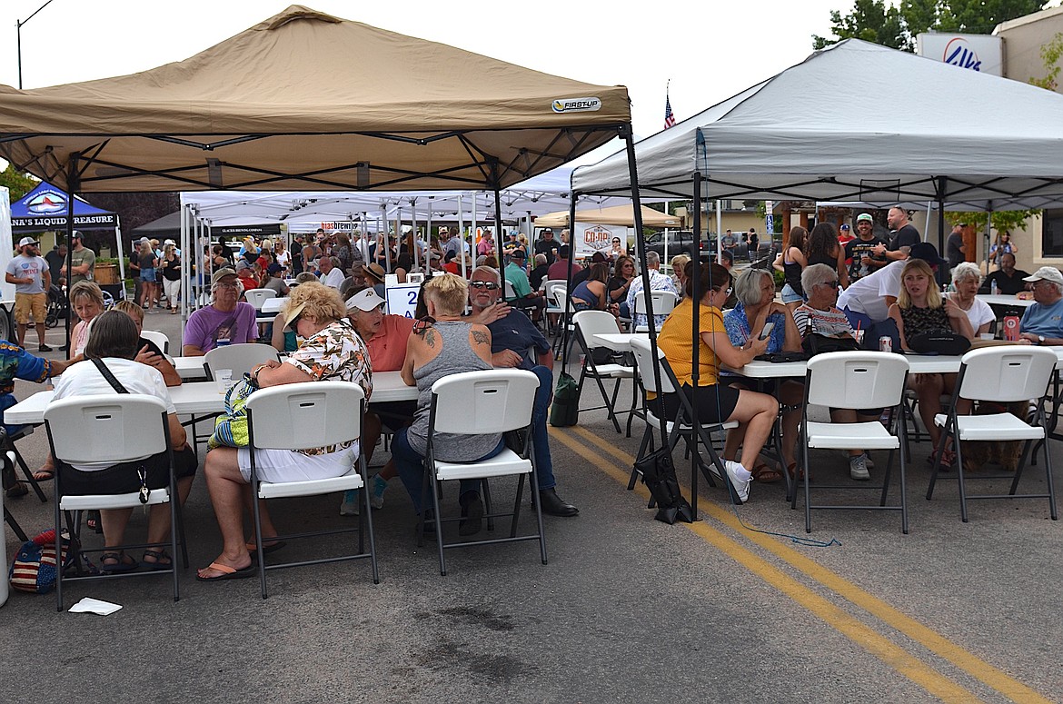 New tents supplied some welcome shade for Rotary BrewFest attendees. (Kristi Niemeyer/Leader)