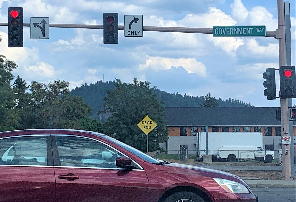 A driver heads south on Government Way just at the intersection with Ironwood Driv.