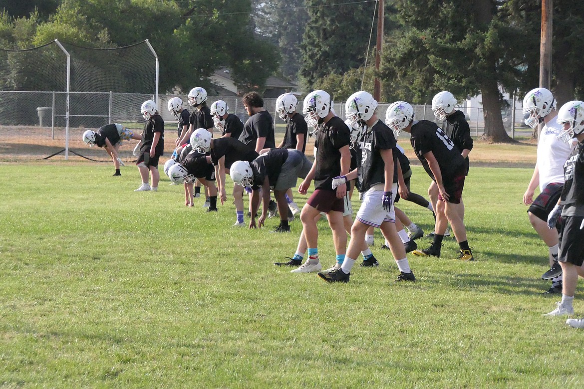 St. Regis/Mullan football players go through in-line agility drills during preseason practices last week in St. Regis.  (Chuck Bandel/MI-VP)