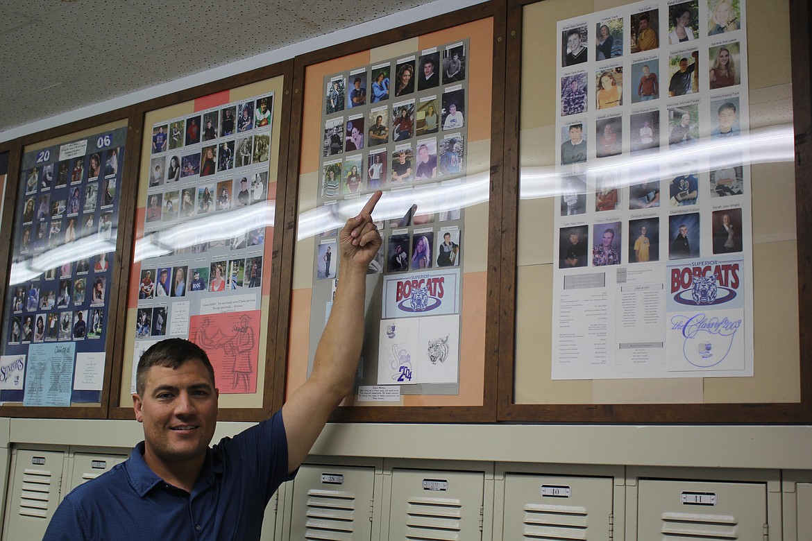 Superior School Superintendent Logan Labbe points to his picture in the 2004 graduating class of Superior High School. To this day, Labbe holds the Class C State record and the school record for the javelin. (Monte Turner/Mineral Independent)