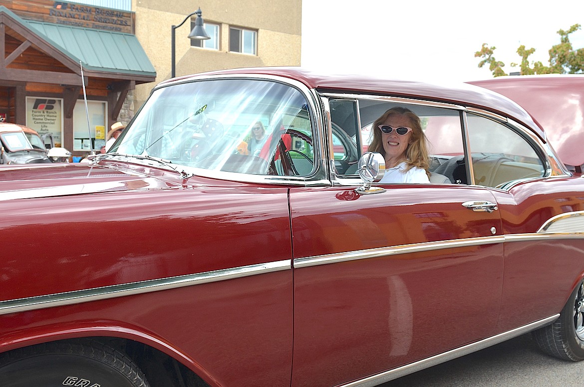 Terry Morin-Cable has been known to don cat classes and a poodle skirt to go with her ’57 Chevy. (Kristi Niemeyer/Leader)