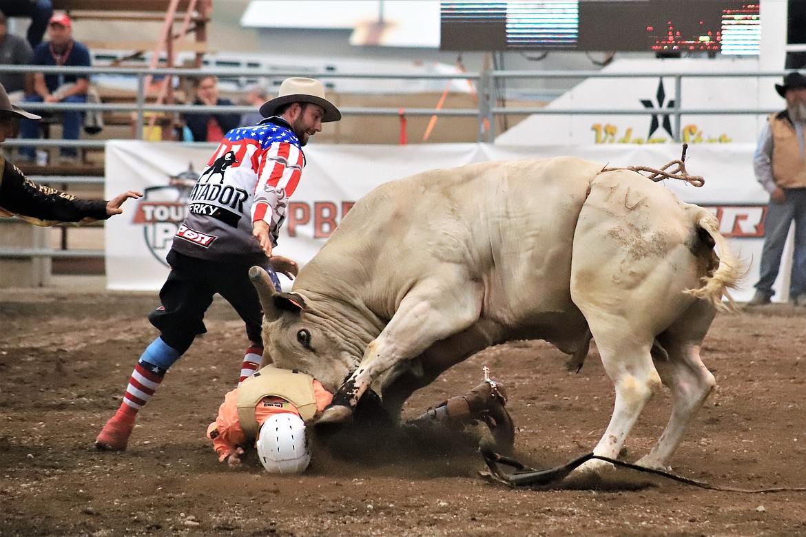 A rider has an up close and personal encounter with a bull at the 2022 Lincoln County Fair in Eureka. (Photo courtesy SvetLana Harper)