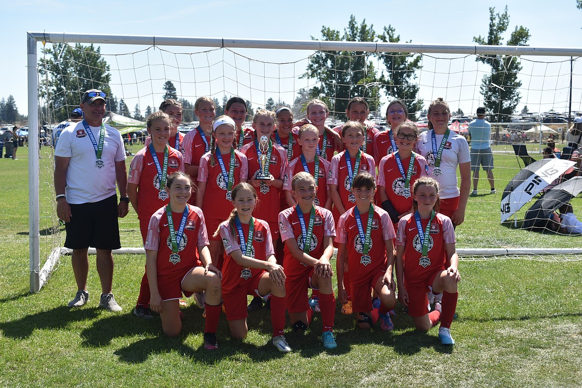 Courtesy photo
The Thorns North FC 11 Girls Academy DPL team took second place in the U13G Gold Bracket last weekend at the Northwest Cup tournament. The Thorns started the tournament on Friday afternoon with a 0-0 tie with Three Rivers Soccer Club 2011 Black. On Saturday, the Thorns began the day with a 2-0 win against the Spokane Sounders Shadow G2011 DPL. Midfielders Victoria Howard and Ava Langer scored the Thorns' two goals, while keepers Constance Ovendale and Mackenzie Dolan teamed for the shutout. Later that day the Thorns tied the Spokane Sounders 11G GA team 1-1, with the Thorns goal coming from Mackenzie Dolan.  Sunday morning the Thorns lost 2-1 to the Spokane Sounders 11G GA team in the tournament final. Olivia Nusser scored the Thorns' only goal on a corner kick late in the second half. In the front row from left are Ella Linder, Aubrey Sargent, Evelyn Haycraft, Victoria Howard and Mackenzie Dolan; second row from left, Ava Langer, Riley Green, Payton Brennan, Olivia Hynes, Avery Thompson and Presley Moreau; and back row from left, coach Mark Plakorus, Kylie Lorona, Brightyn Gatten, Olivia Nusser, Emillia Meyer, Zoe Lemmon, Vivian Hartzell, Emily Hackett and Constance Ovendale.