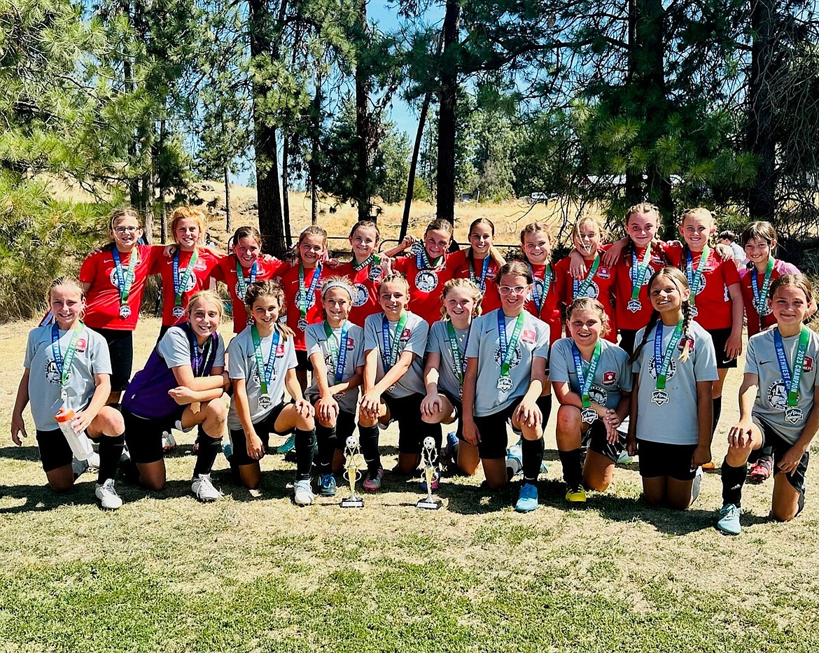 Courtesy photo
The Thorns girls 2013 took two soccer teams to the Northwest Cup in Spokane last weekend and finished first and second in the Silver Division. The Thorns Black (wearing gray in picture) finished first, and the Thorns Red finished second. In the front row from left are Nora Schock, Kyal Carlson, Brielle Buscema, Presley Hart, Addison Salas, Kaylee Evans, Kinsey Kiefer, Eva Frost, Alexis Morisette and Hayden Hays; and back row from left, Felicity Miller, Kinsley Young, Emma Storlie, Finley Martin, Sierra De La Paz, Nevie Sousley, Amalia Cramer, Alli Legg, Nora Snyder, Peyton Cantrell, Evellyn Howard and Sophia Quigley.