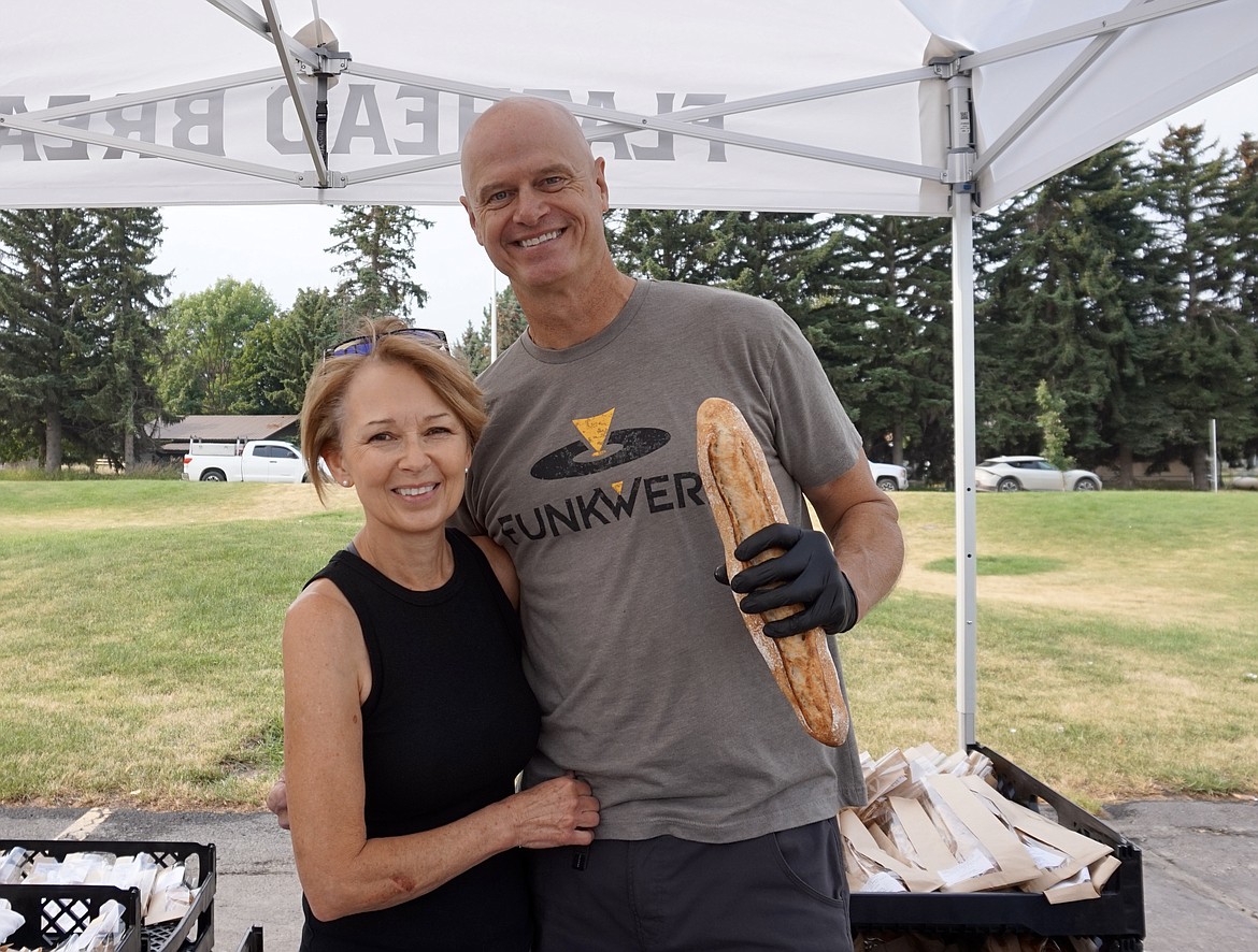 Wendy Hall and Tim Crist with Flathead Bread sell their bread at the Whitefish and Kalispell farmers markets. (Summer Zalesky/Daily Inter Lake)