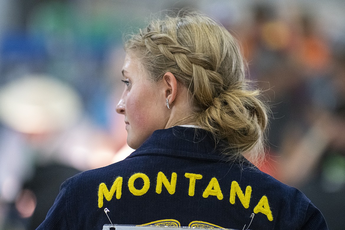 Rylee Glimm looks to the judge during a beef showmanship round at Flathead County Fairgrounds on Wednesday, Aug. 16. (Avery Howe/Hungry Horse News)